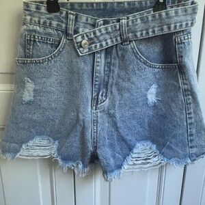DISTRESSED ASYMMETRICAL WAIST DENIM SHORTS